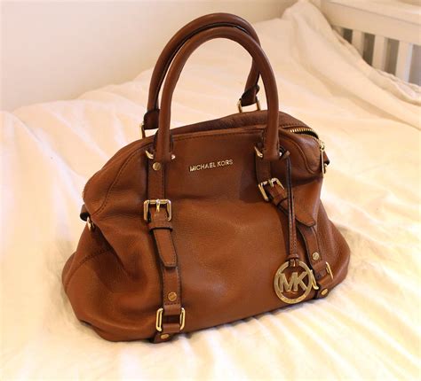 michael kors old purses|used michael kors handbags.